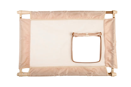 Beige baby gate on a white background