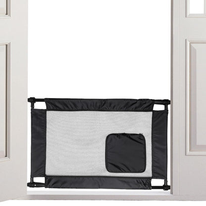 Black and gray pet gate in a doorway