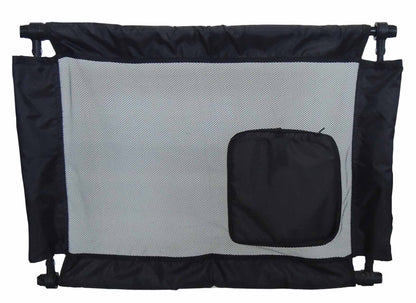 Black and gray pet gate with mesh panel and storage pouch on a white background