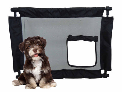 Pet carrier with a small dog sitting inside on a white background