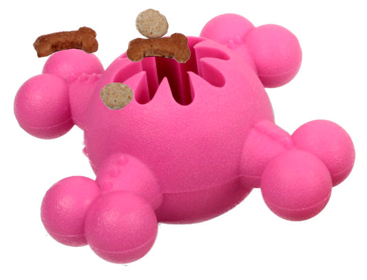 Pink dog toy shaped like a bone with treat dispensers on a white background
