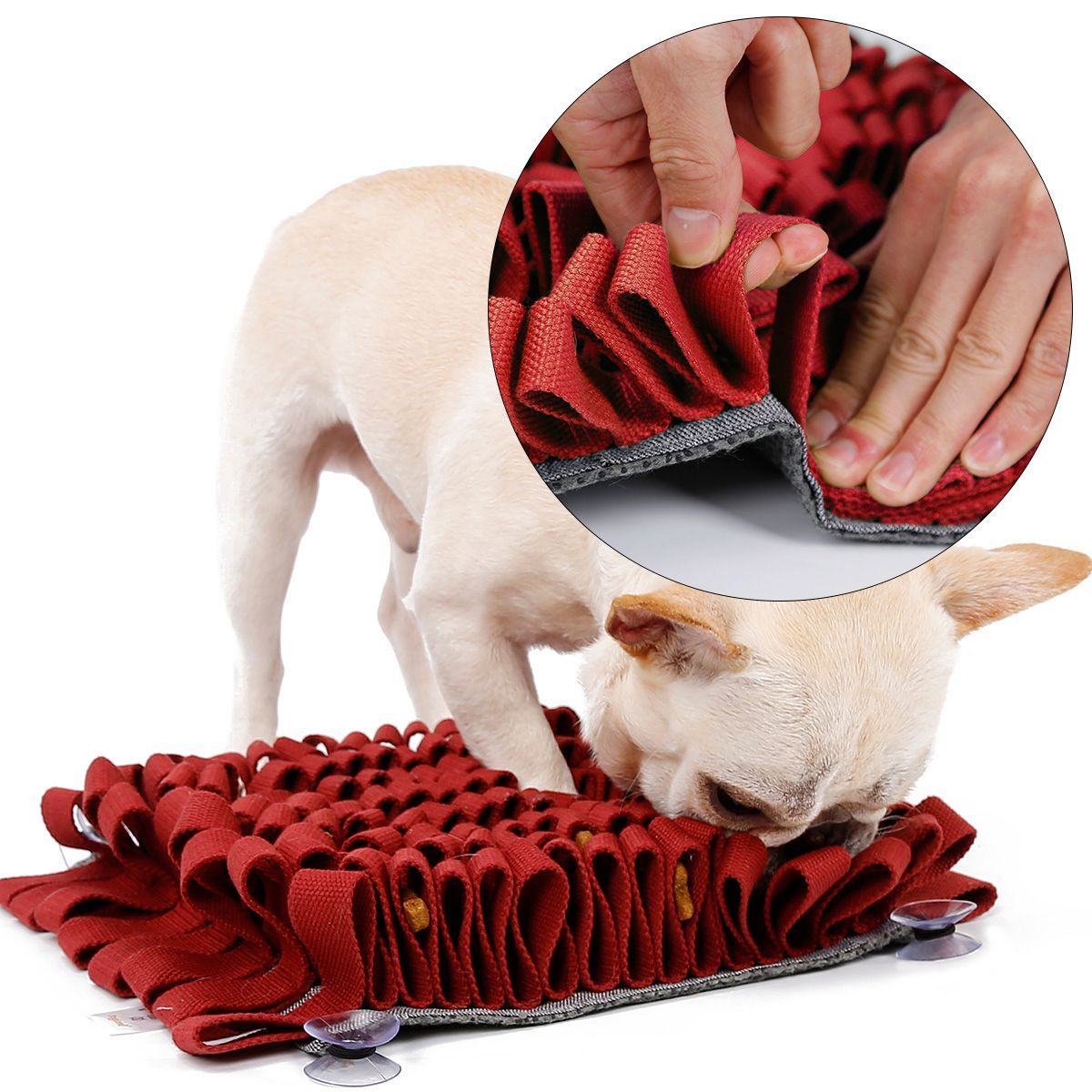 Red pet mat with a dog sniffing it, close-up of hands folding the mat, on a white background.
