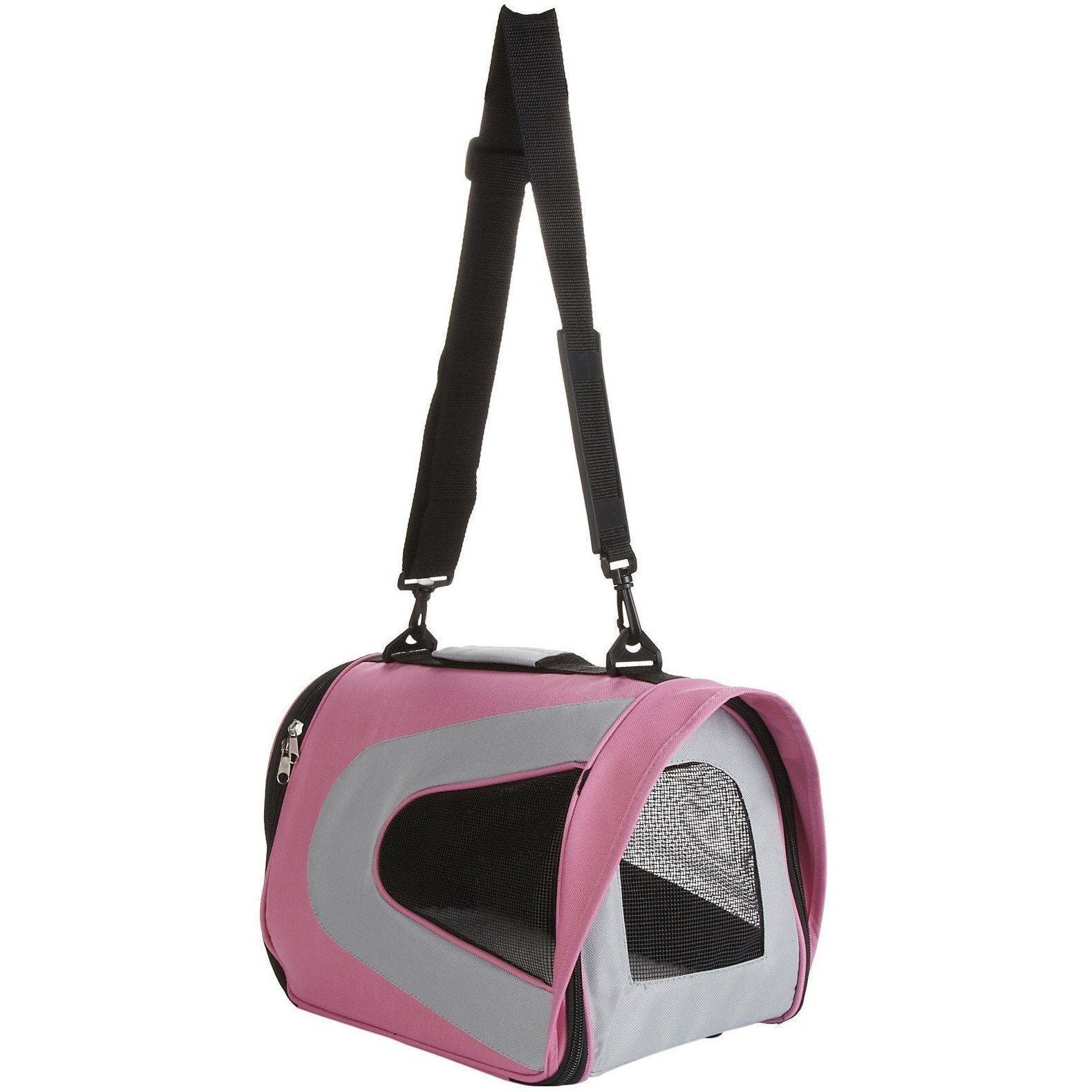 Pink and gray pet carrier with a black strap on a white background