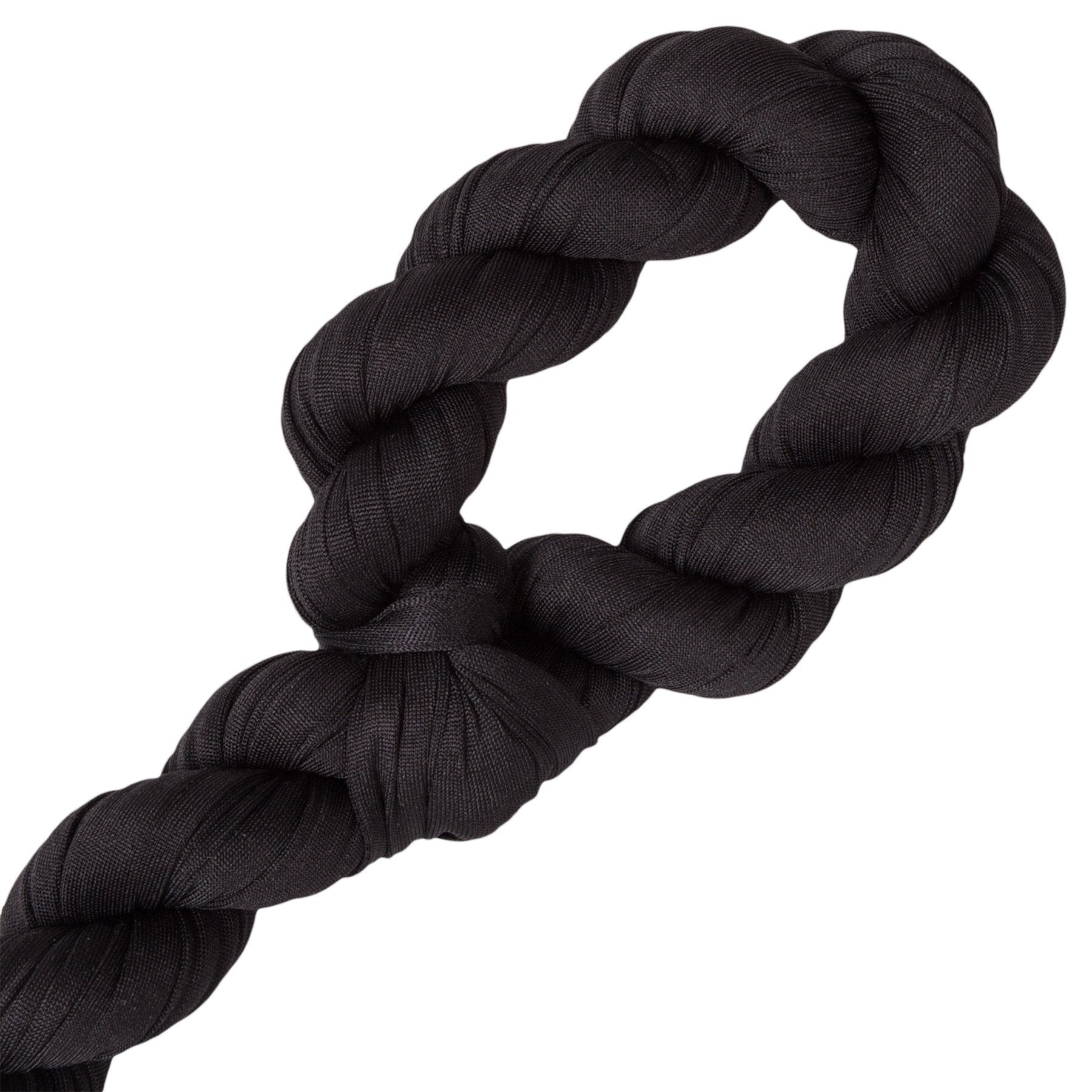 Black rope toy on a white background