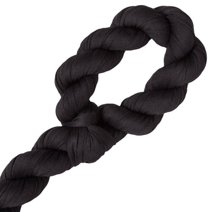Black rope toy on a white background