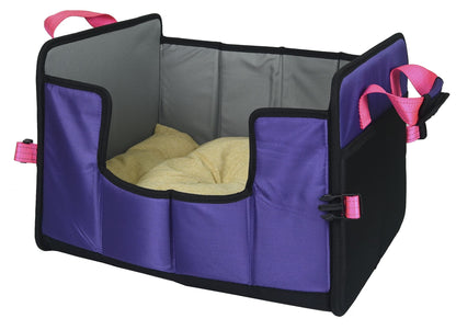 Purple pet carrier with gray interior and pink straps on a white background
