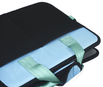 Black and light blue bag with green straps on a white background