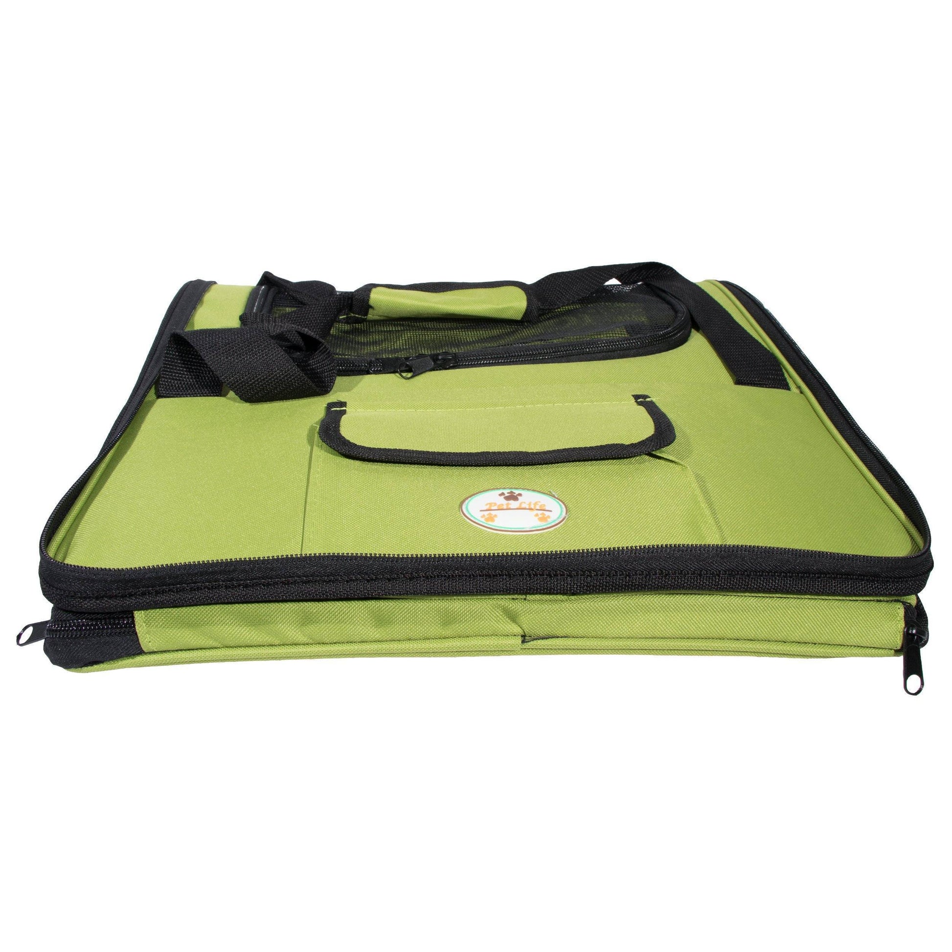 Green pet carrier with black trim on a white background