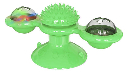 Green pet toy with multiple compartments on a white background