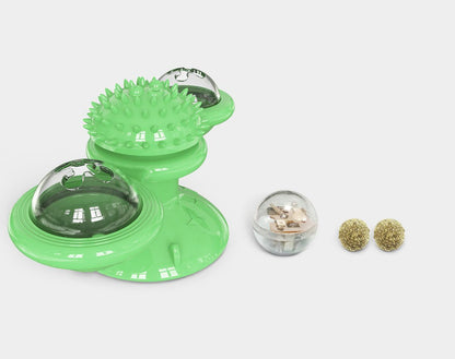 Green pet toy with a transparent ball and small items on a white background