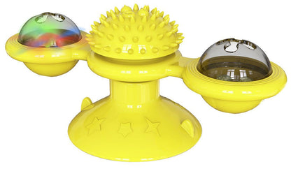 Yellow pet toy with multiple compartments on a white background