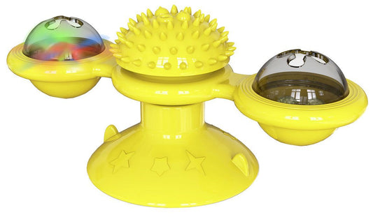 Yellow pet toy with multiple compartments on a white background