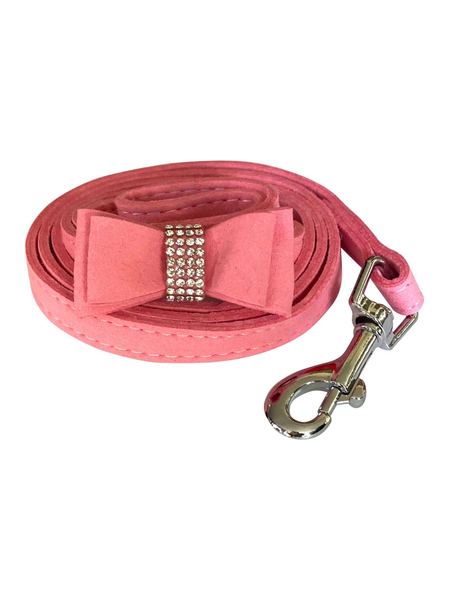 Pink dog leash with a bow and rhinestones on a white background