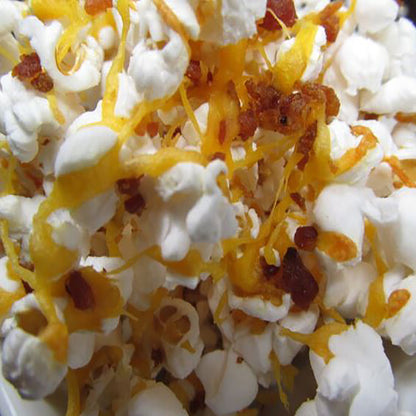 Close-up of popcorn with cheese and bacon bits