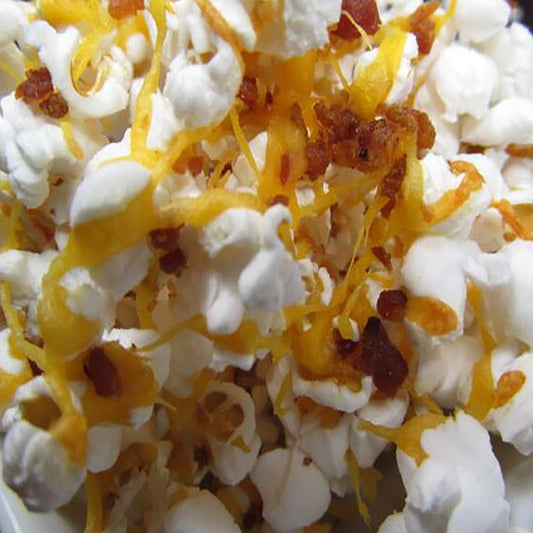 Close-up of popcorn with cheese and bacon bits