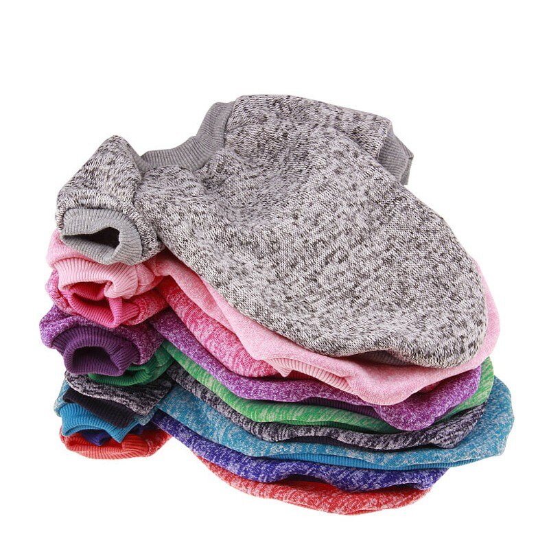 Stack of colorful socks on a white background