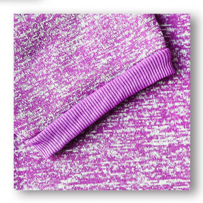 Purple textured fabric with ribbed trim on a matching background