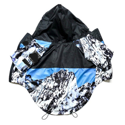 Hooded jacket with mountain pattern on a white background
