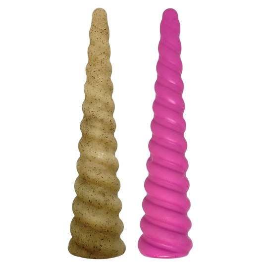 Two textured cylindrical objects, one beige and one pink, on a white background.