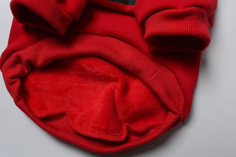 Red sweater on a light gray background