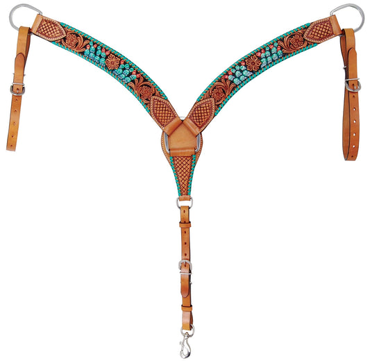 Decorative leather bridle with intricate patterns on a white background