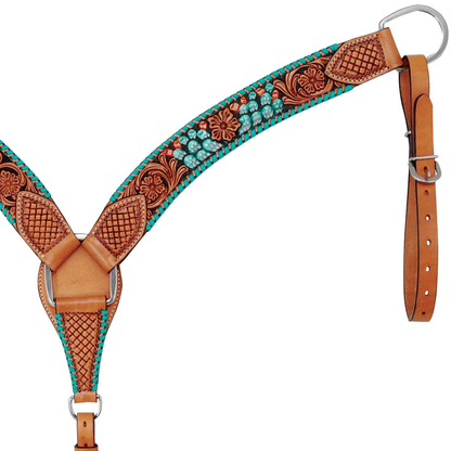 Decorative leather bridle with turquoise and brown patterns on a white background