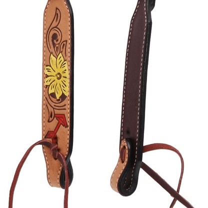Decorative leather strap with floral design on a white background