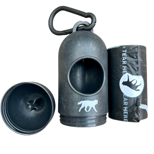 Black pet training device with carabiner and packaging on a white background