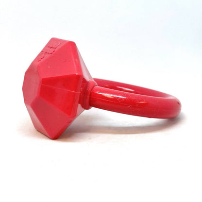 Red plastic tool on a white background