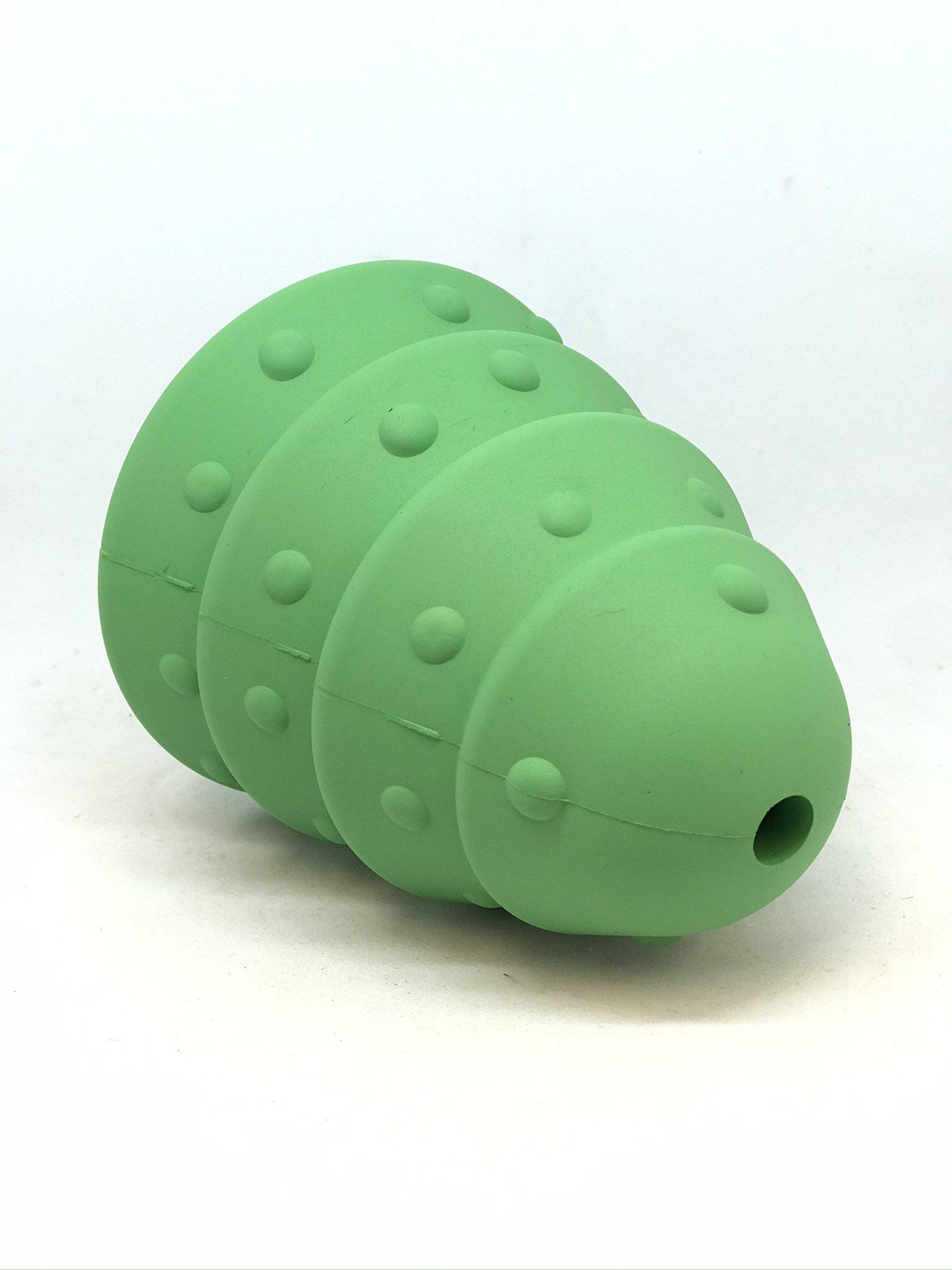 Green silicone bee-shaped toy on a white background