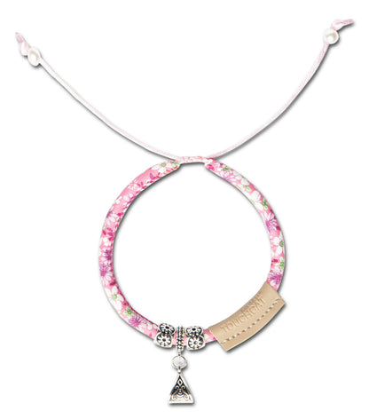 Necklace with floral pattern and pendant on a white background