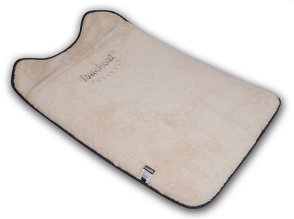 Beige car mat with black border on a white background