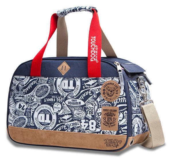 Designer handbag with a patterned design and red handle on a white background