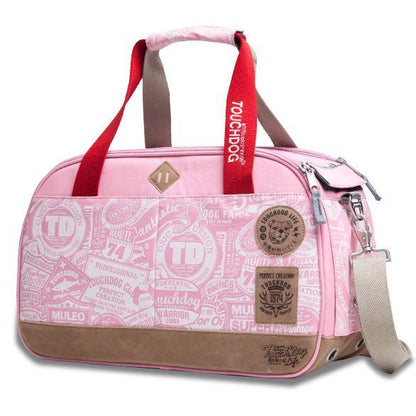 Pink duffel bag with red handle and brown accents on a white background