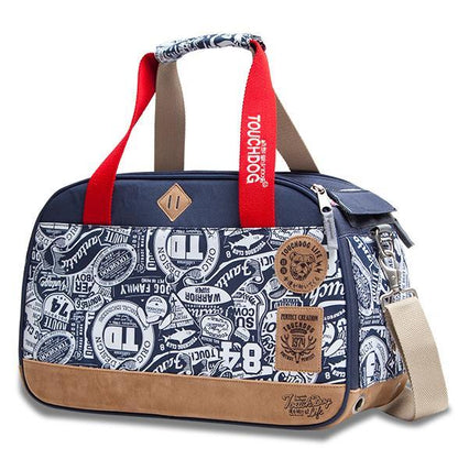 Blue patterned bag with red handle and brown accents on a white background