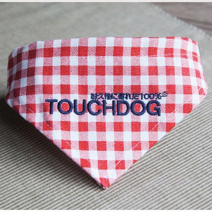 Red and white checkered bandana with 'TOUCHDOG' branding on a textured surface