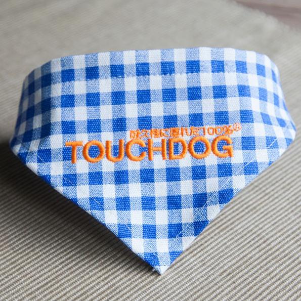 Blue and white checkered bandana with 'TOUCHDOG' branding on a textured surface