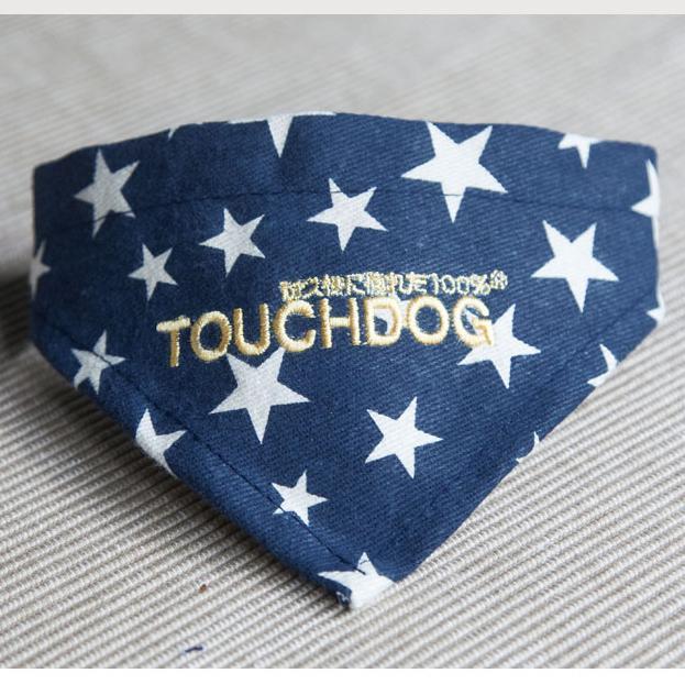 Navy blue bandana with white stars and 'TOUCHDOG' branding on a textured surface.