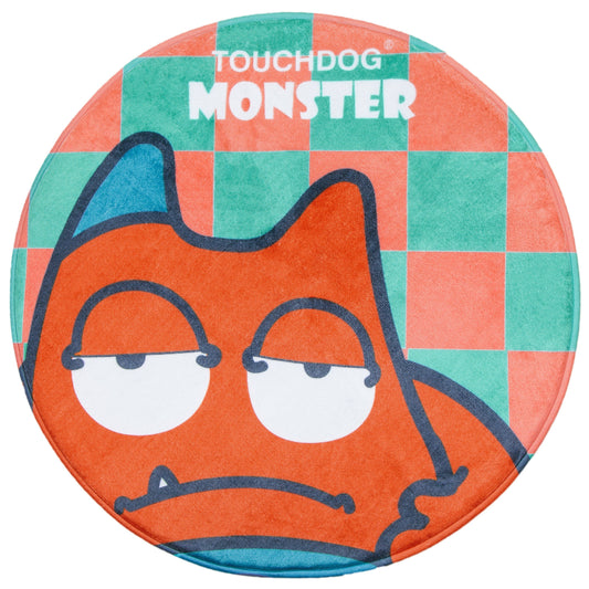 Round product with cartoon monster design and 'Touchdog Monster' text on a checkered background