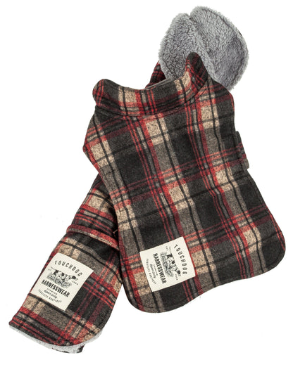 Plaid dog coat with gray hood on a white background