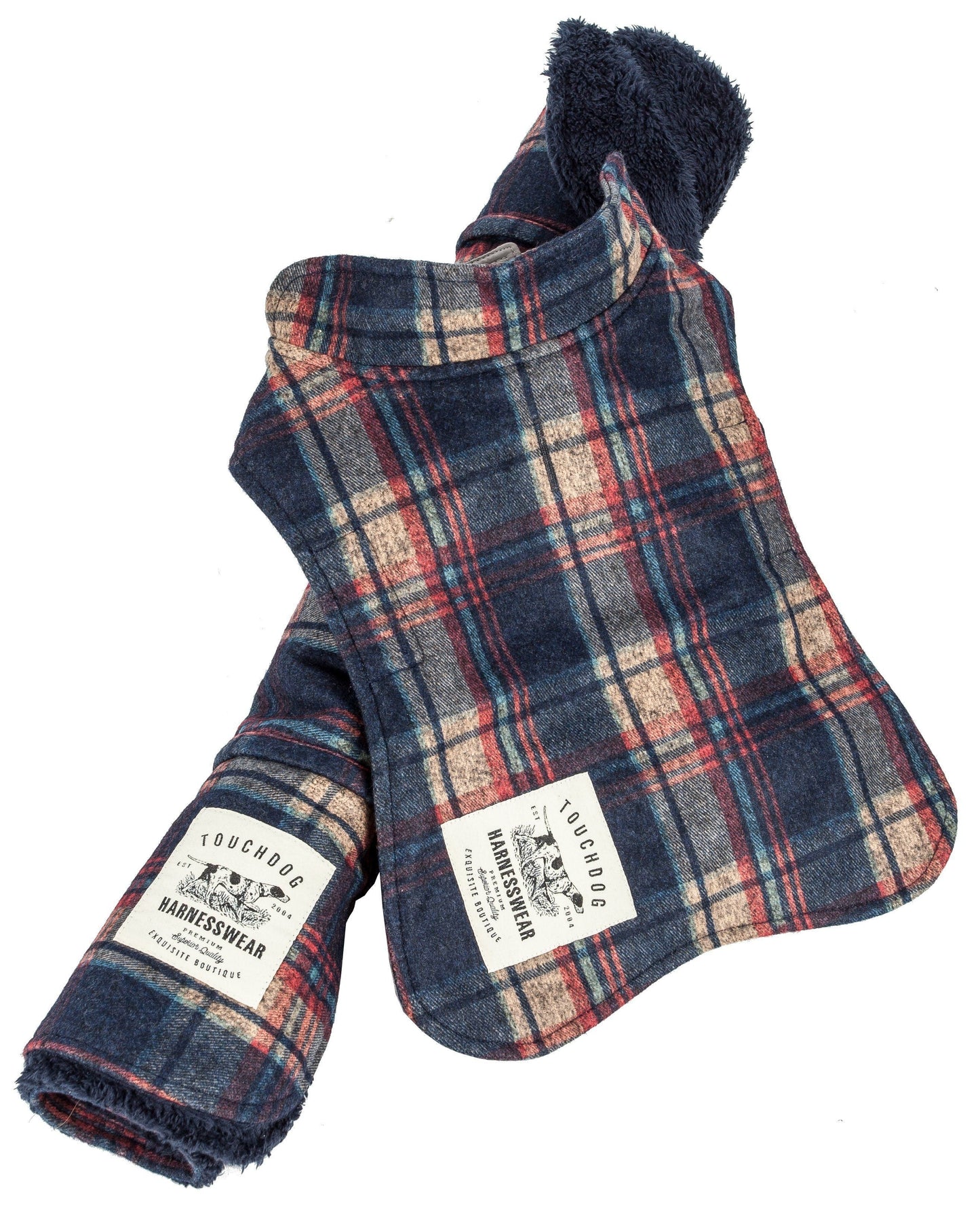 Plaid dog harness vest with brand label on a white background