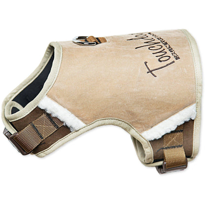 Beige dog harness with brown straps on a white background
