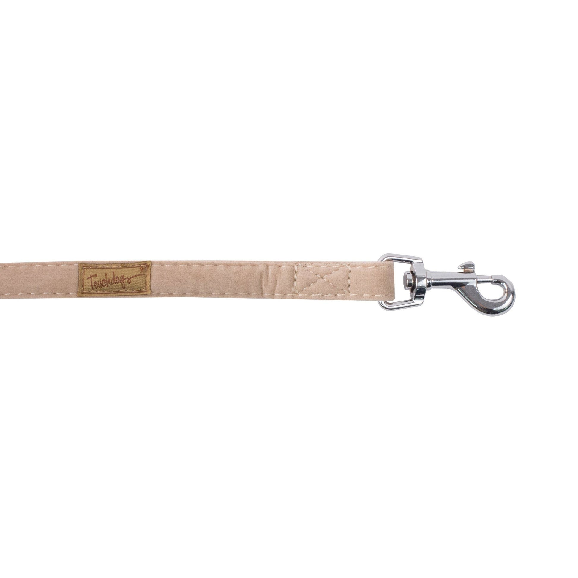 Beige dog leash with a metal clip on a white background