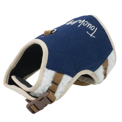 Dog harness with quilted design and visible brand name on a white background