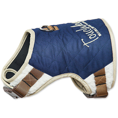 Blue dog harness with brown straps on a white background