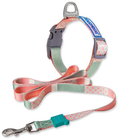 Dog collar and leash set with pink and green pattern on a white background