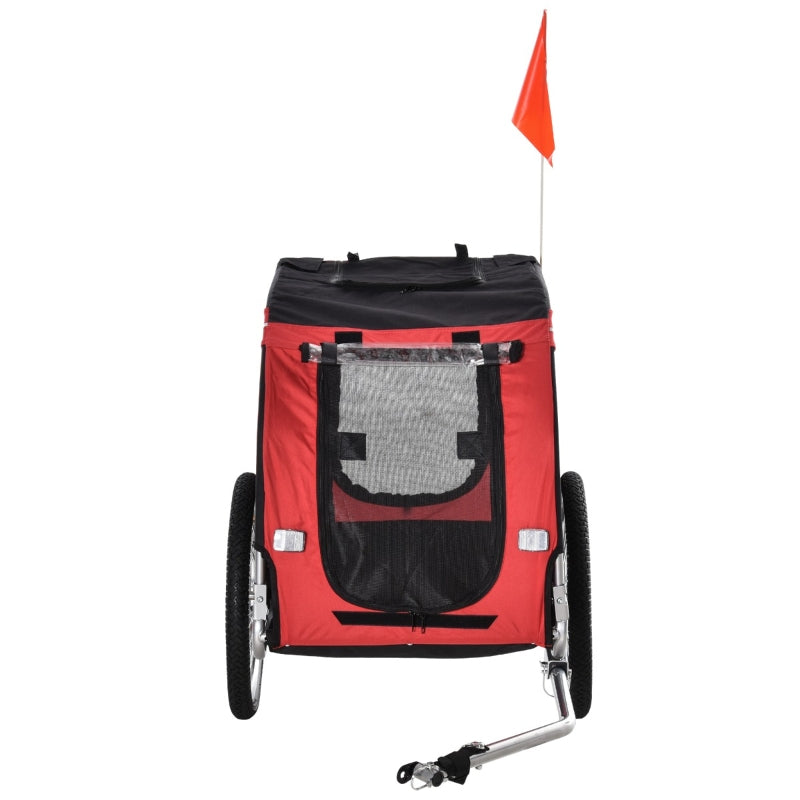 Red and black pet stroller with a flag on a white background