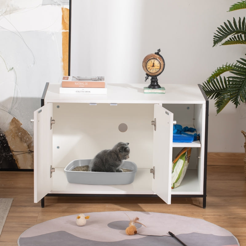 Pet litter box inside a white cabinet with a cat inside, on a wooden floor.