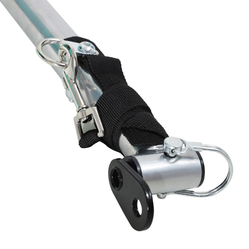Metal rod with black strap and silver clamps on a white background